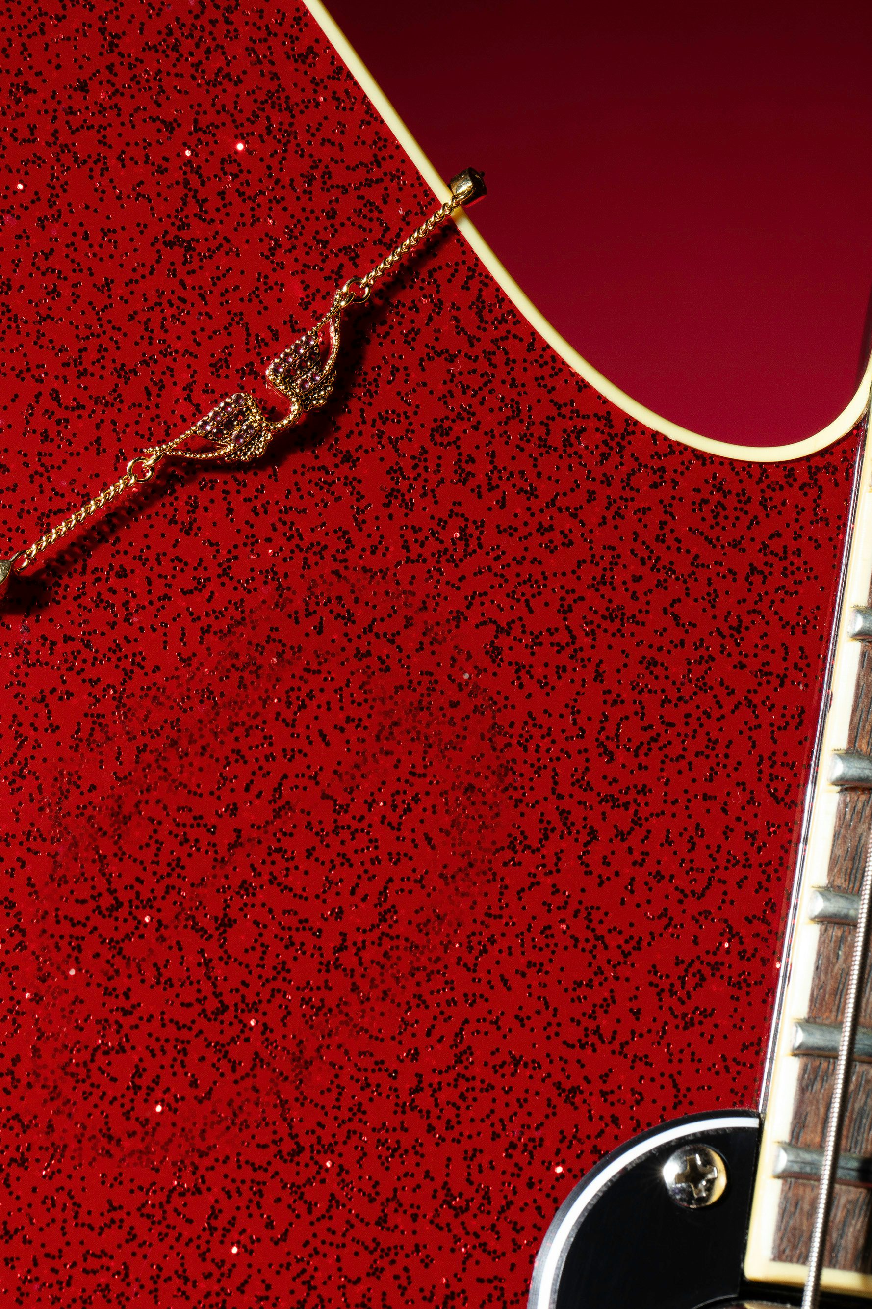 Rock Bracelet - Chain bracelet with wings in brass and rhinestones.